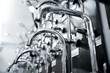 © romaset - Rows of metal water taps at the showroom of a large store
