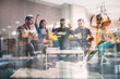 © alphaspirit - Business people in office are happy for the company trend and the success of the startup