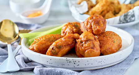 Wall Mural - spicy buffalo chicken wings on plate