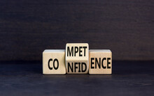 Competence And Confidence Symbol. Concept Word Competence Confidence On Wooden Cubes. Beautiful Black Table Black Background. Business And Competence And Confidence Concept. Copy Space.