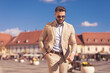 © Viorel Sima - businessman putting hand in pocket and looking down