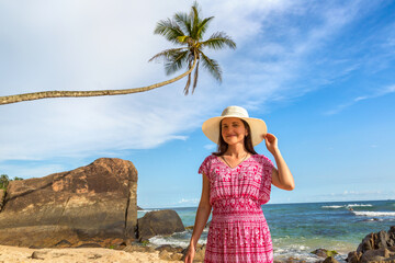 Poster - Woman on a tropical beach