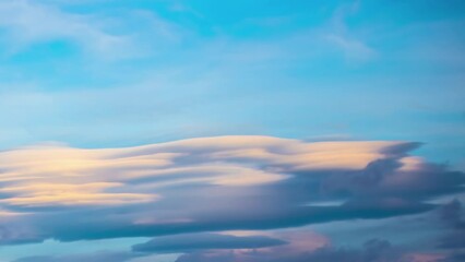 Wall Mural - Majestic clouds moving in sky during sunset, fusion time lapse