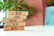 Wooden blocks with words 'You are what you eat'.