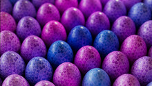 Blue And Pink Easter Background. Collection Of Neatly Arranged Eggs With Heart Designs.