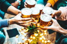 Group Of People Drinking Beer At Brewery Pub Restaurant - Happy Friends Enjoying Happy Hour Sitting At Bar Table - Closeup Image Of Brew Glasses - Food And Beverage Lifestyle Concept