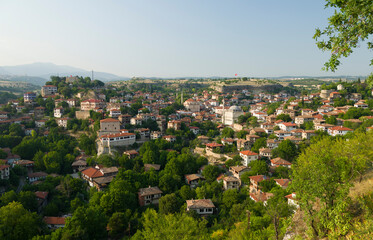 Wall Mural - View of the historical famous Safranbolu Ottoman houses. Evening on a summer day. City in UNESCO World Heritage Site. Karabuk city, Turkey