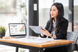 © David - Business Asian woman working at office with documents on her desk, doing planning analyzing the financial report, business plan investment, finance analysis concept