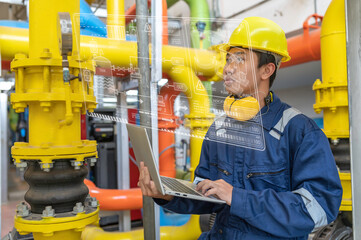 Wall Mural - Maintenance technician at a heating plant,Petrochemical workers supervise the operation of gas and oil pipelines in the factory,Engineers put hearing protector At room with many pipes