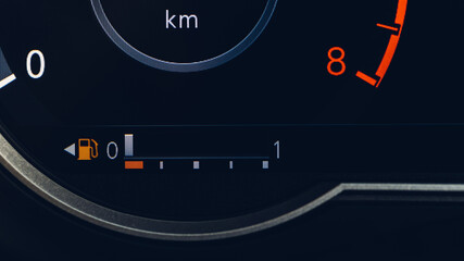 Empty fuel warning light in car dashboard. Fuel pump icon. gasoline gauge dash board in car with digital warning sign of run out of fuel turn on. Low level of fuel show on speedometer dashboard.