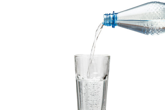 Fototapete - isolated bottle with water and drinking glass over transparent background