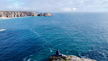 Canvas Print - Sunny day in Porthcurno beach Cornwall, England February 2023.