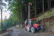 Traktor and forest cableway for timber concentration uphill, downhill on beskid mountains.
