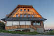 Chalet  on Lysa hora, the highest hill of Beskid mountains, Czech republic, sunset time.