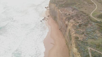 Wall Mural - The Twelve Apostles on a stormy afternoon, overhead aerial view, Australia