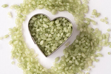 Wall Mural - Uncooked Jade Rice in a Heart Shape