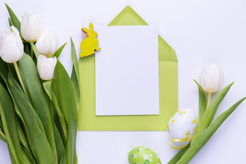 Wall Mural - Template for Easter greeting card. Blank card with an envelope and bouquet of white tulips