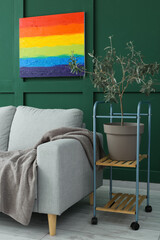 Poster - Painting of LGBT flag hanging on green wall in living room