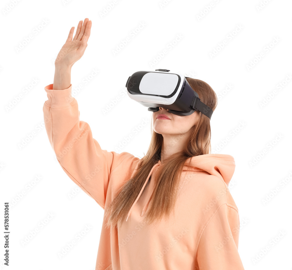 Pretty young woman in VR glasses isolated on white background