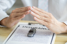 Loss Adjuster Insurance Agent Inspecting Damaged Car. .Sales Manager Giving Advice Application Form Document Considering Mortgage Loan Offer For Car  insurance