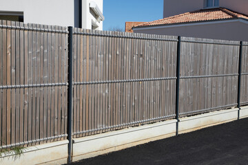 wall wooden and steel fence street wood barrier modern house protect view home garden