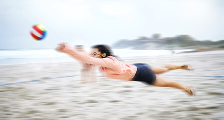 Beach volleyball, diving or sports woman playing a game in training or workout in summer together. Team fitness, dive action or active girl on sand in a fun competitive match in Sao Paulo, Brazil