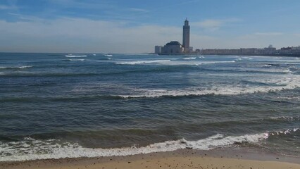 Wall Mural - Scenic view of Hassan II mosque from the walking alley. Casablanca, Morocco