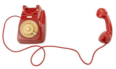 Old red rotary dial telephone with handset and cord, cut out