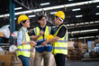 © Jirus - Asian warehouse workers team talk about Inventory check and product delivery in retail warehouse full of shelves with goods. teamwork at warehouse storage department.