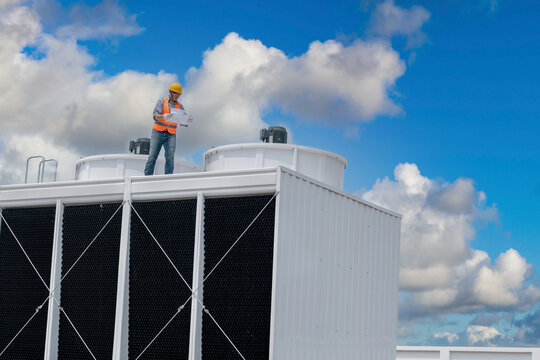 industry engineer under checking the industry cooling tower air conditioner is water cooling tower a