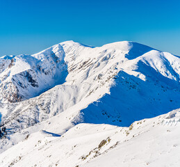 Wall Mural - Poland 2022. Beautiful view on the snow Tatry.
Zakopane, Giewont, Kasprowy Wierch, Swinica, Rysy, Kresanica