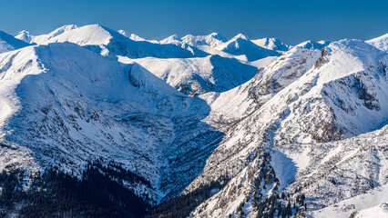 Wall Mural - Poland 2022. Beautiful view on the snow Tatry.
Zakopane, Giewont, Kasprowy Wierch, Swinica, Rysy, Kresanica