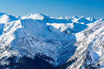 Wall Mural - Poland 2022. Beautiful view on the snow Tatry.
Zakopane, Giewont, Kasprowy Wierch, Swinica, Rysy, Kresanica