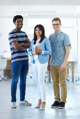 Canvas Print - The team you need. Cropped portrait of three coworkers standing in the office.