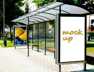 Wall Mural - bus shelter at a busstop. blank billboard ad display. empty white lightbox sign. glass and aluminum frame. city transit station. wood bench inside. urban street setting. outdoor advertising concept