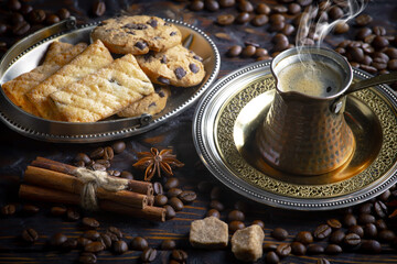 Wall Mural - Espresso coffee with coffee beans on old background.