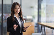© Wasan - Portrait businesswoman beautiful asian woman in business office.