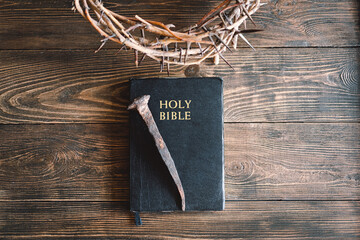 Poster - Crown thorns and holy bible or book on a wood background, copy space. Concept for faith, spirituality and religion