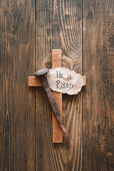 Wall Mural - He is Risen. Jesus Crown Thorns and nails and cross on a wood background. Crucifixion Of Jesus Christ. Passion Of Jesus Christ. Concept for faith, spirituality and religion. Easter Day