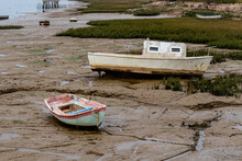 Abandoned Boats On The Mud