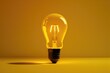 © Eugene Verbitskiy - Glowing light bulb on a yellow background. Isolated, close up.