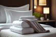 © thejokercze - Fresh towels on bed in hotel room created with AI