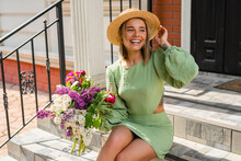 Beautiful Young Woman In Summer Style Outfit Smiling Happy Walking With Flowers In City Street