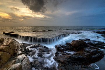 Wall Mural - Waterfalls in the middle of the ocean. At the Hang Rai in the Chua mountain resort
