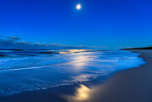 Beautiful Baltic Sea Beach On The Hel Peninsula With The Full Moon. Poland