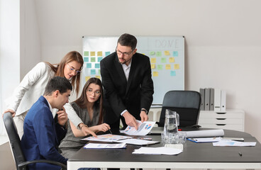 Sticker - Group of people working on business plan in office