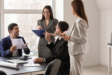 Sticker - Group of people working on business plan in office