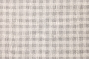 Poster - Beige checkered tablecloth as background, top view