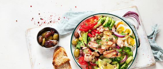 Wall Mural - Tuna salad with lettuce, eggs and tomatoes.