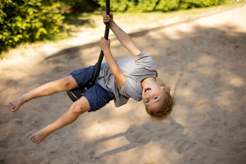 Sticker - Cute child, playing on the playground, boy playing